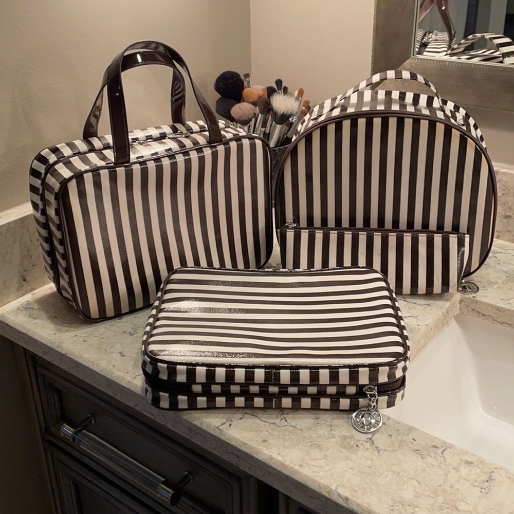 Fabulous set of Henri Bendel Iconic Travel Bags